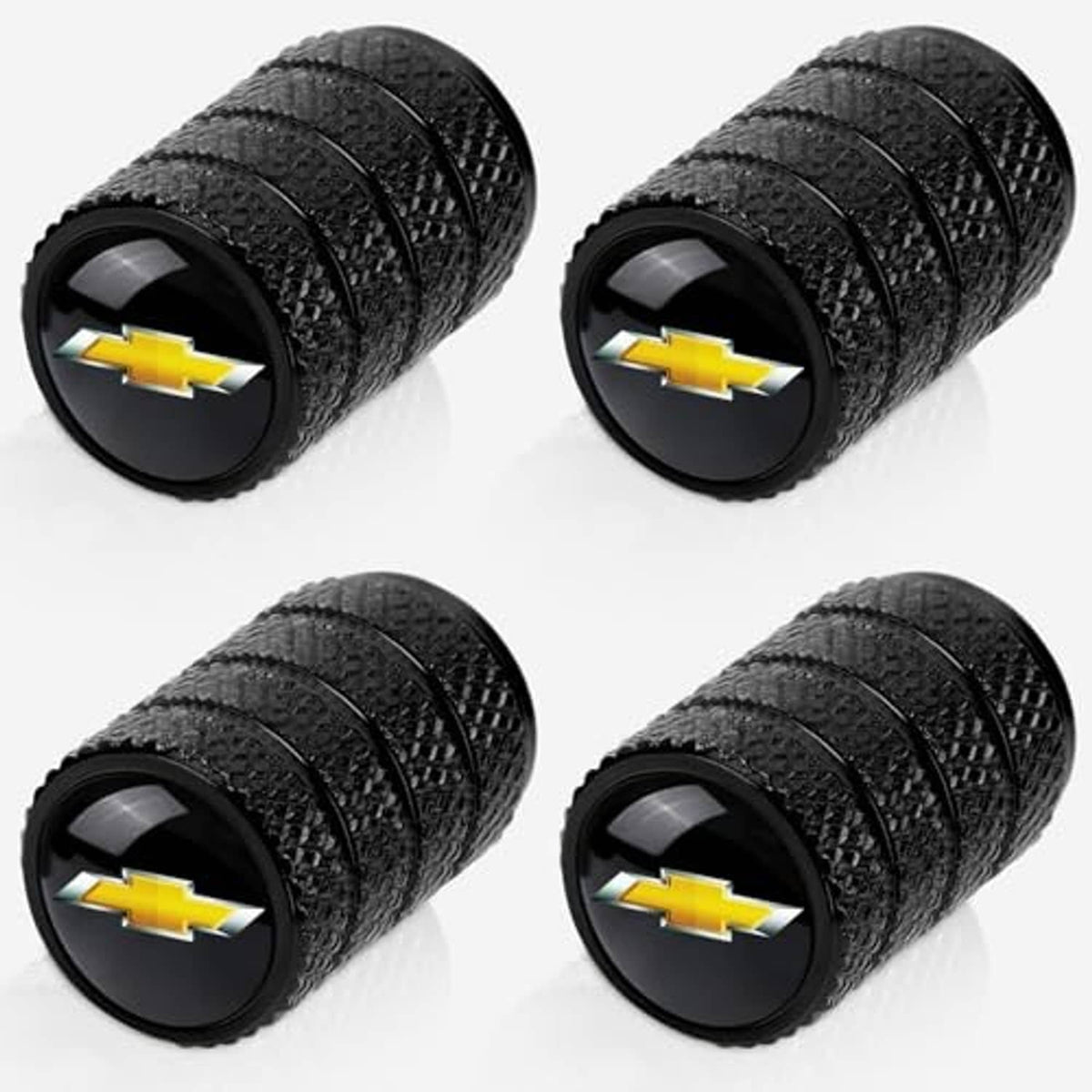 Black textured tire valve stem caps with gold Chevrolet bowtie logos, four-pack