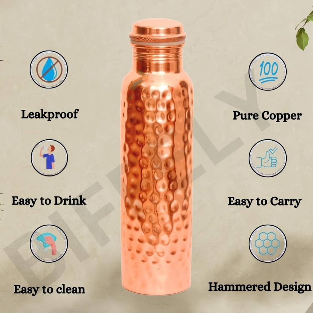 Copper water bottle with hammered design and leakproof screw-top cap.