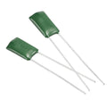 Green metallized film capacitors with two leads each, silver pins