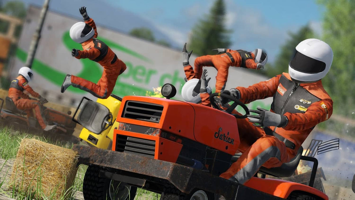 Orange demolition race vehicle with drivers in helmets launching during a crash