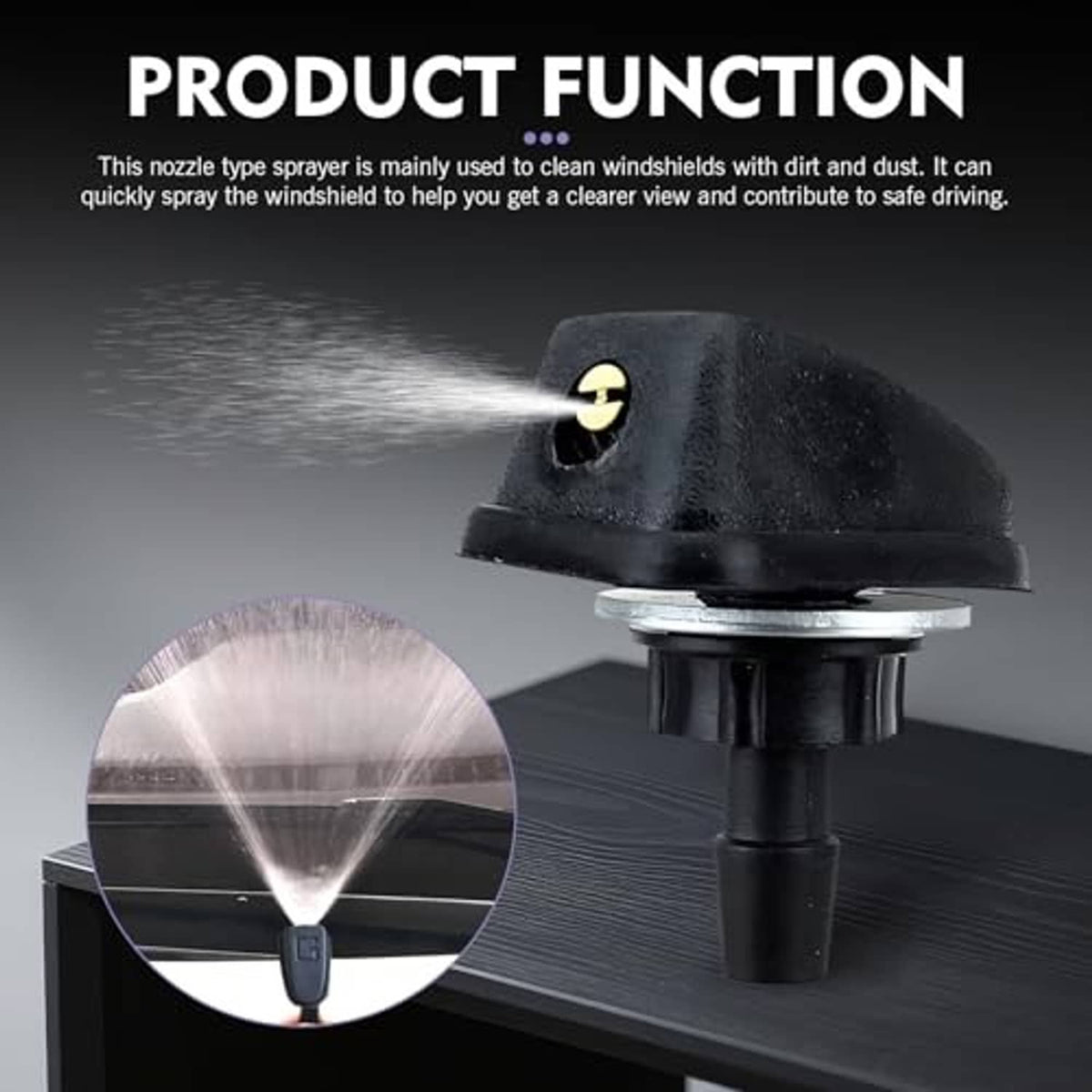Black windshield washer nozzle with gold insert spraying a fine mist stream
