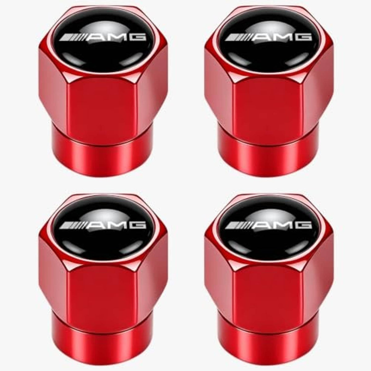 Set of red metal tire valve stem caps with black AMG logo oval insert