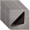 Self-adhesive carpet tile with speckled dark gray surface and layered backing visible