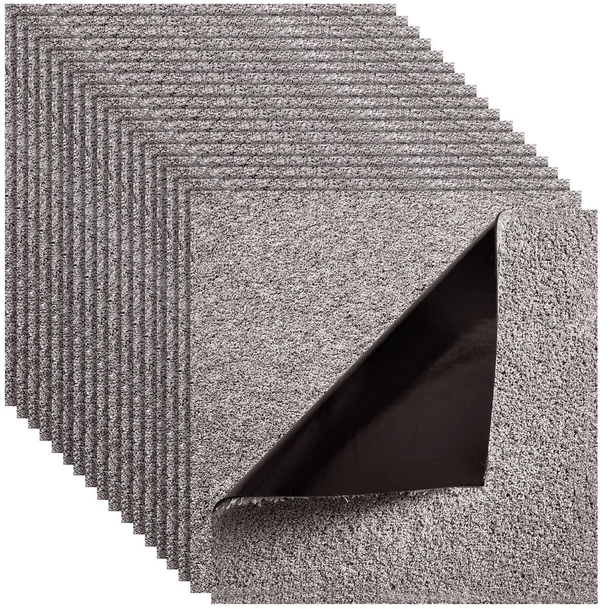 Self-adhesive carpet tile with speckled dark gray surface and layered backing visible