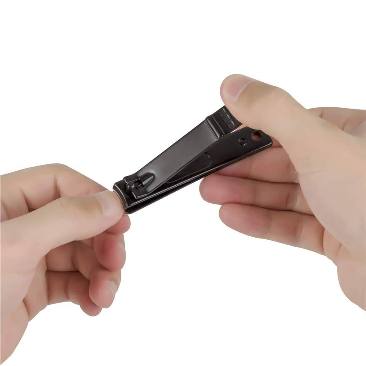 Hands holding black wide-jaw toenail clippers, showing lever and wide cutting head