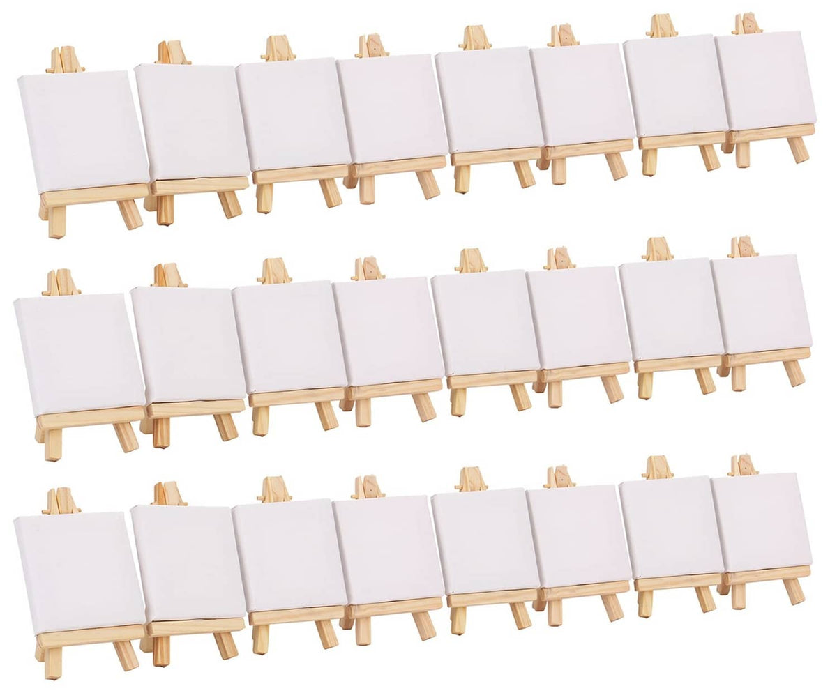 Mini canvas and wooden easel set with multiple white canvases on small stands