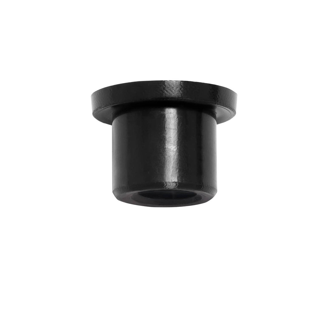 Black rubber leaf spring bushing with metal insert, side view