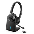Black wireless over-ear headset with boom microphone and charging stand