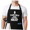 Black BBQ apron with bold 'THIS GUY RUBS HIS OWN MEAT' print, neck strap, front pocket