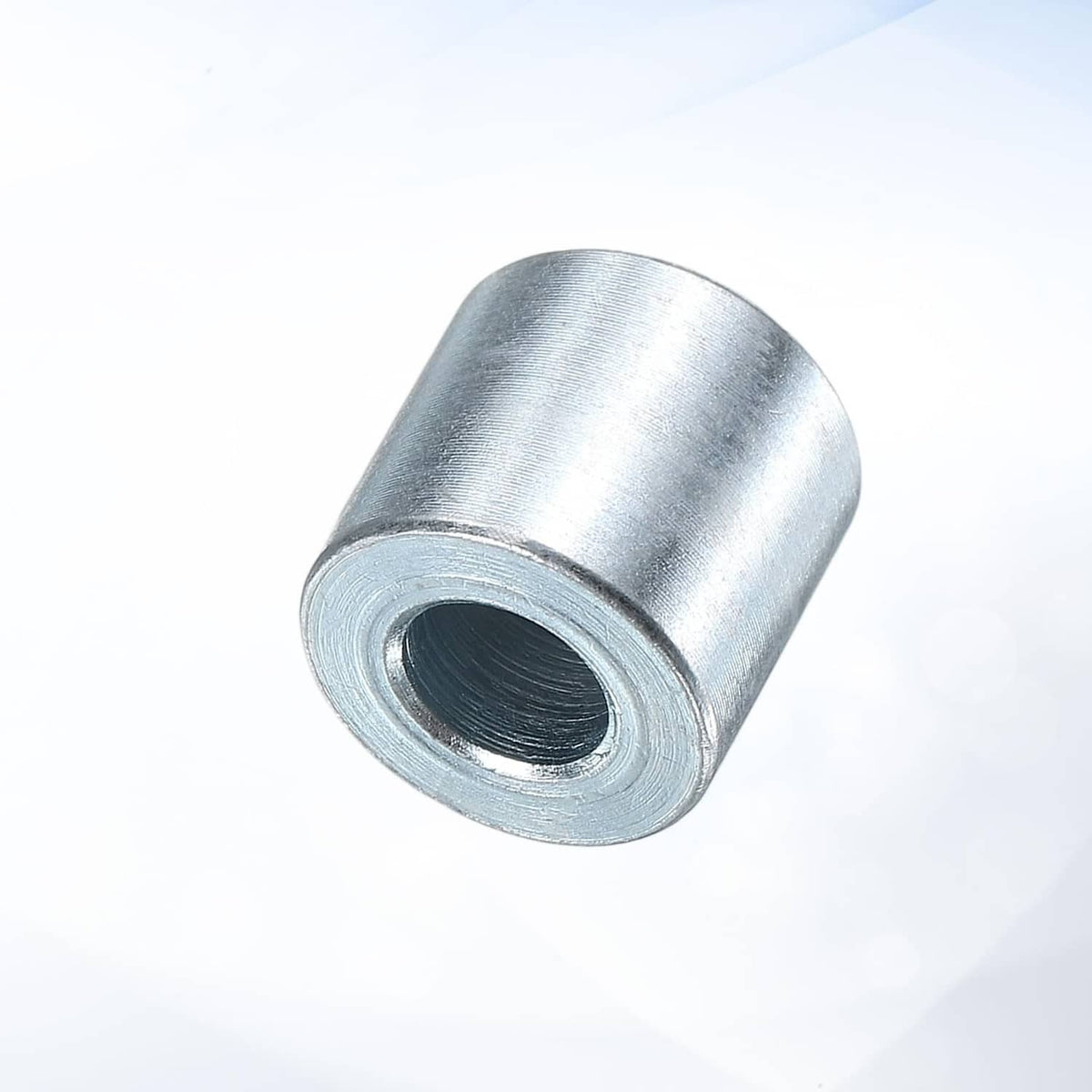 Silver spacer bushing with open end and central hole