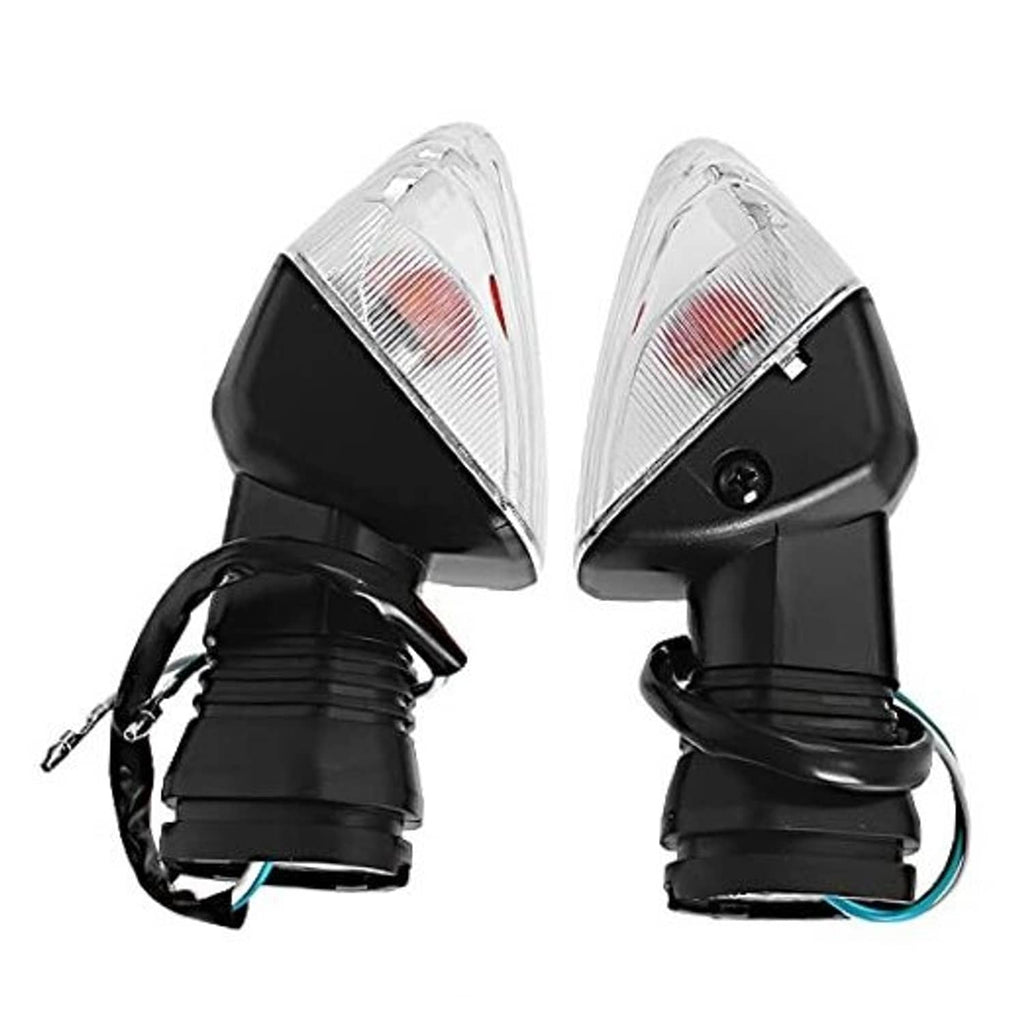 Pair of motorcycle turn signal indicator lights with clear lens, black housing, and wiring