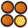 Set of four 4-inch round amber LED strobe trailer lights with black housing