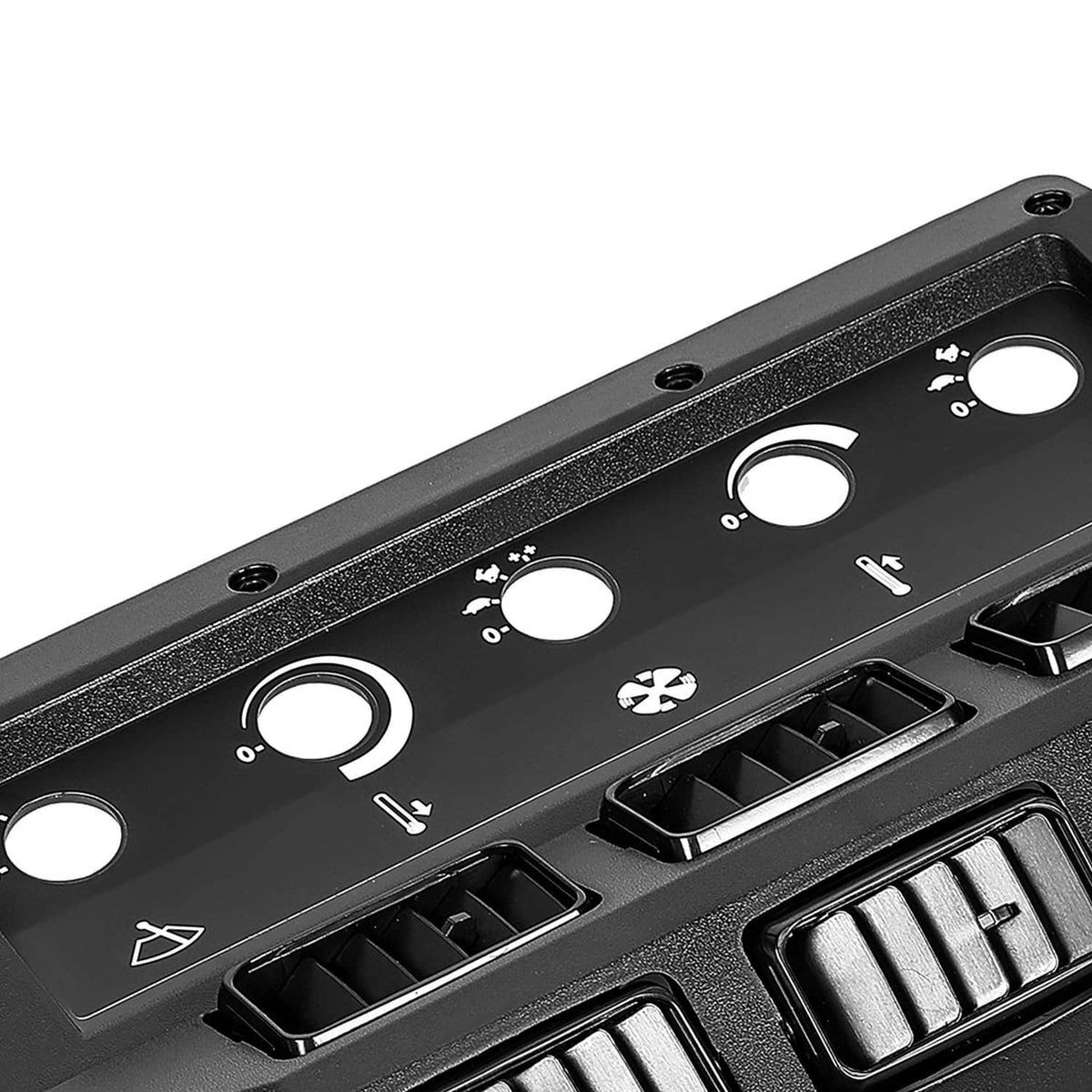 A/C heat control panel bezel close-up of circular knobs and vent openings