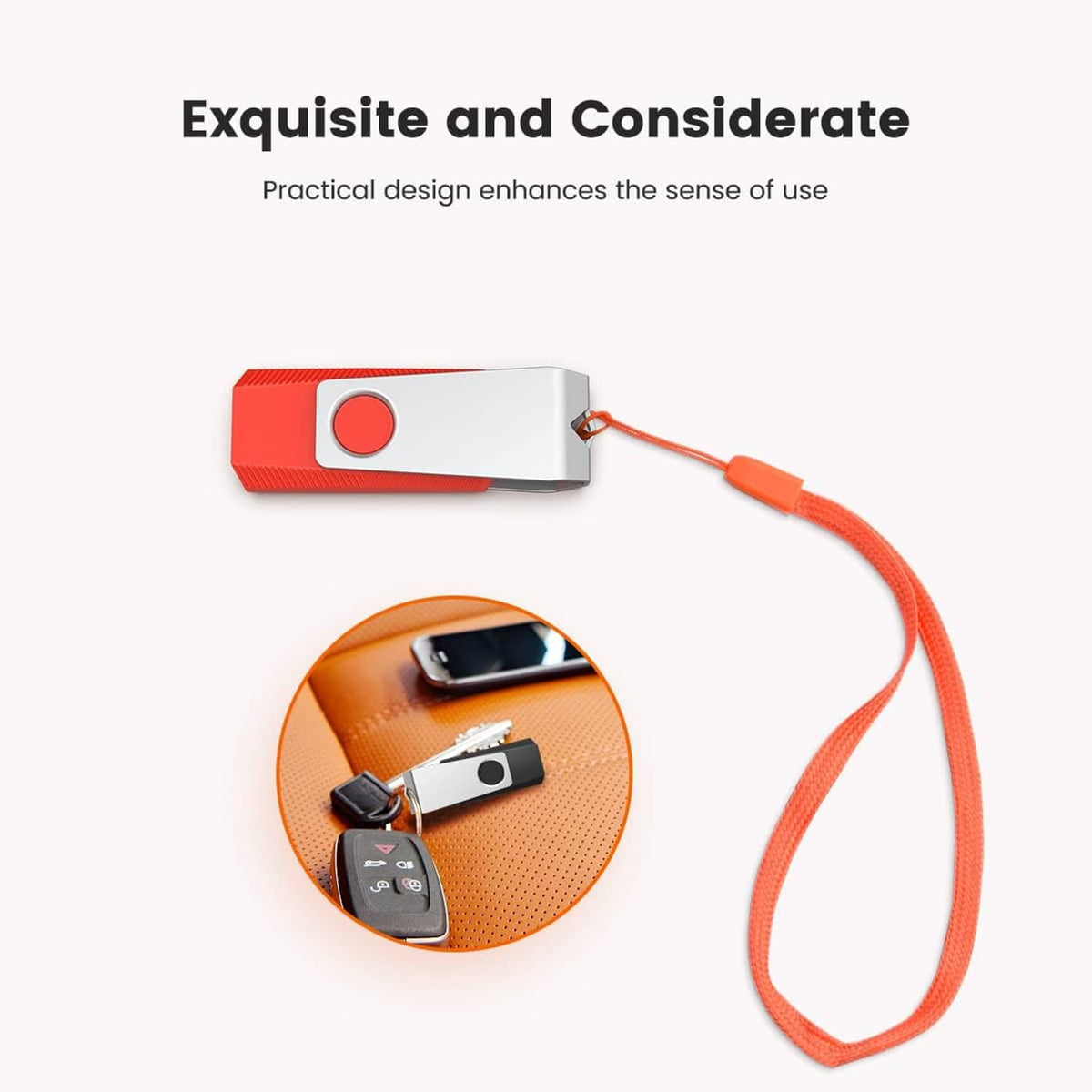Orange and silver USB flash drive with attached lanyard strap for carrying