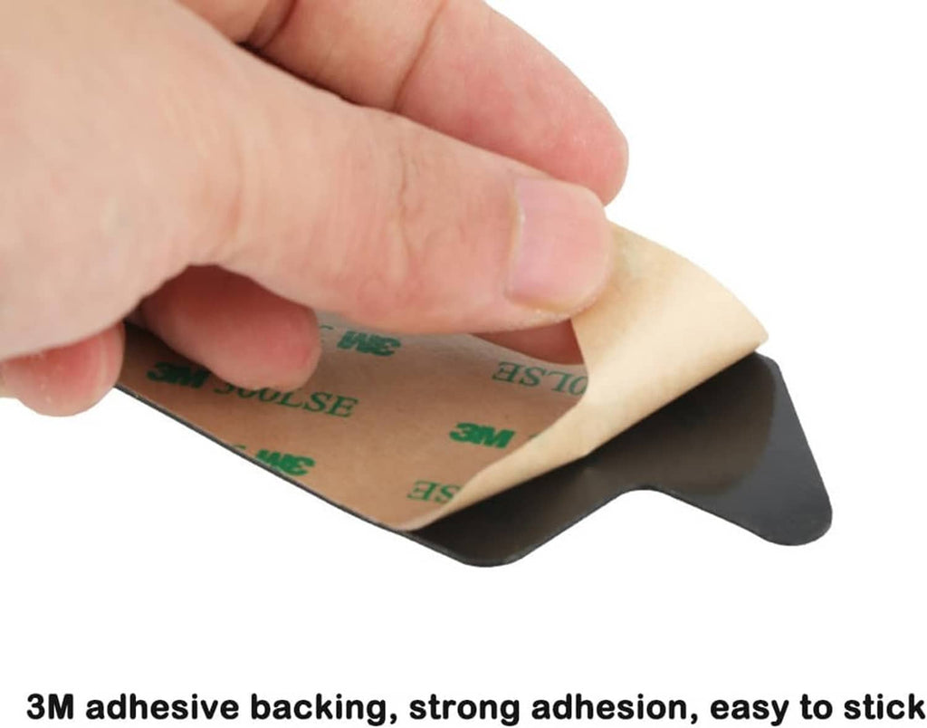 Hand peeling adhesive backing from a tan 3M-labeled chainstay protector sticker