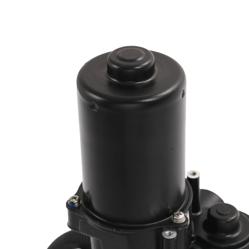 Power running board motor, black cylindrical housing with mounting screws and end cap
