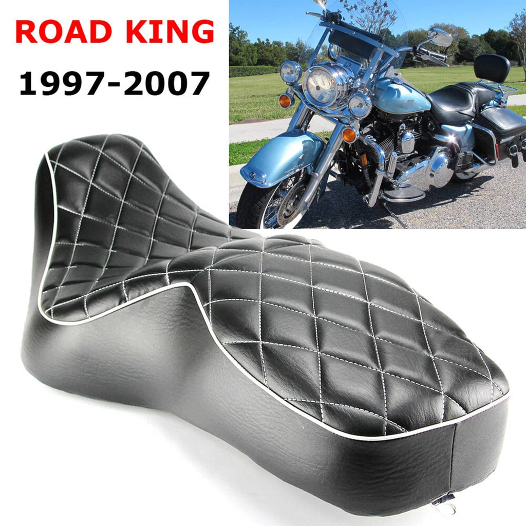 Black two-up motorcycle seat with diamond quilt upholstery and white edge piping