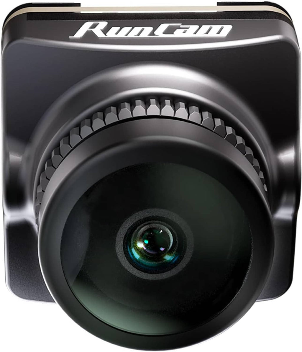 FPV camera close-up of lens with dark glass and hood ring