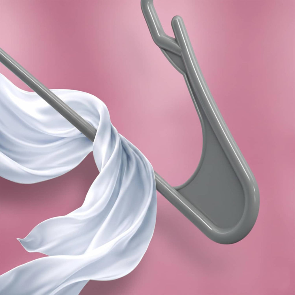 Gray plastic hanger hook and shoulder, holding draped white fabric