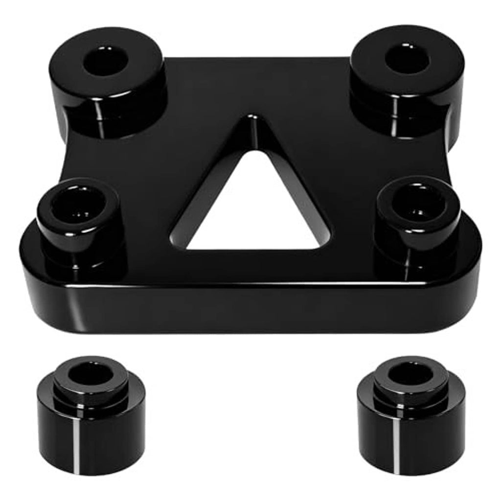 Black handlebar riser adapter plate with triangular cutout and four knob-style mounting caps