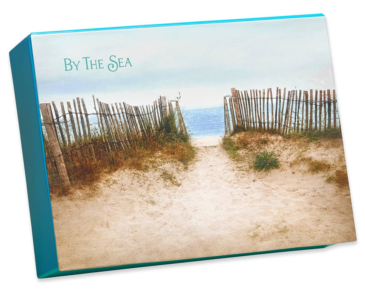 Teal-framed note card with "By The Sea" beach pathway and fence artwork
