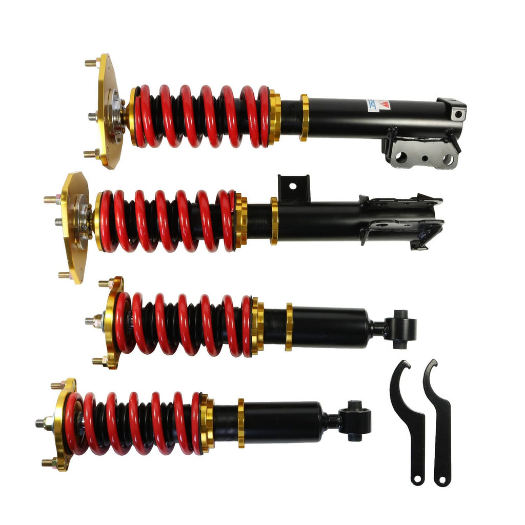 Adjustable coilover suspension kit with red springs, black shocks, gold hardware