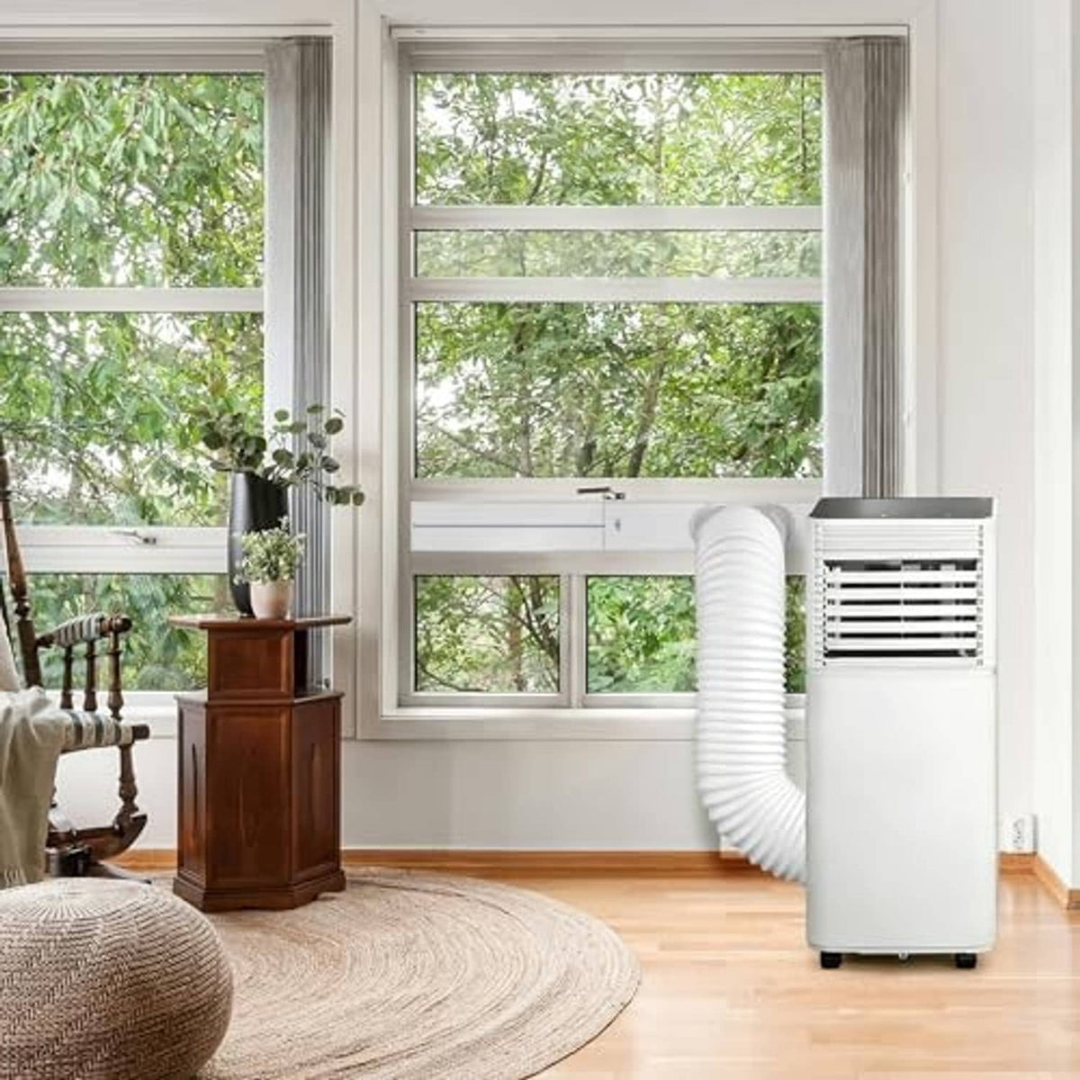 Air conditioner window exhaust vent kit installed with flexible hose through the window