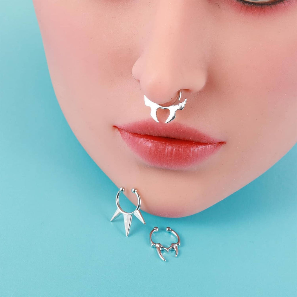 Silver spiked faux septum hoop rings near lips, non-piercing style
