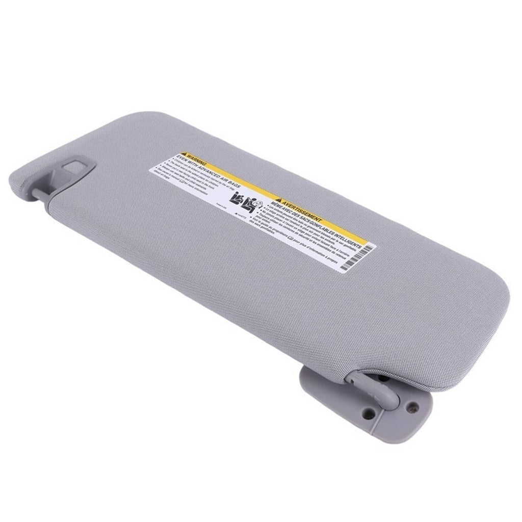 Grey sun visor back side with instruction label and two mounting hole points