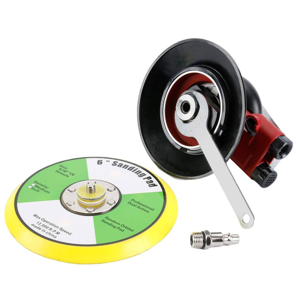 Random orbital palm sander with yellow pad, green abrasive disc, and wrench tool