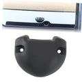 Black rocker switch base cover with two mounting holes and raised grip