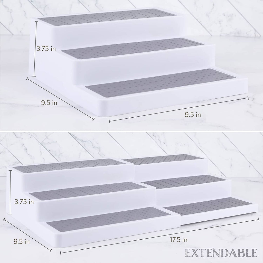 Expandable 3-tier white spice rack with gray perforated shelves, extended length.