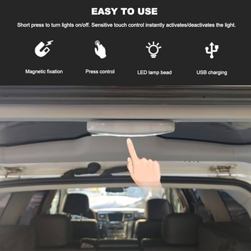 Gray car dome LED light attached under the vehicle roof; finger near control