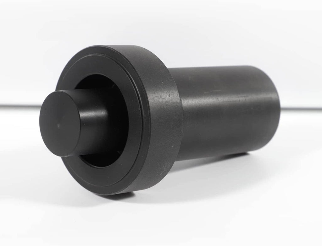 Black cylindrical seal installer tool with circular flange end, angled view