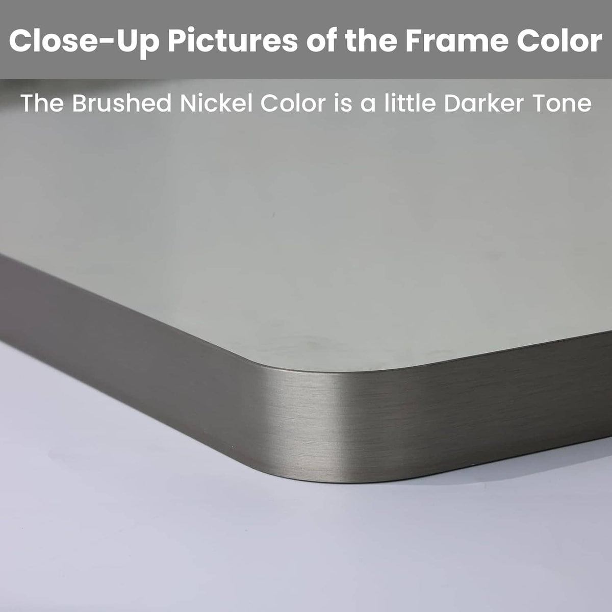 Brushed nickel metal mirror frame corner with smooth rounded edge for a rounded rectangle shape