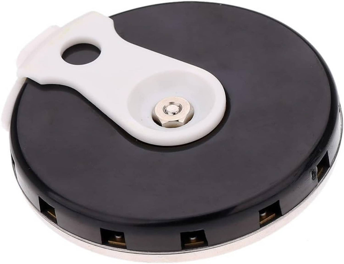 Black pitch pipe tuner underside with white tab, center screw, and vent slots