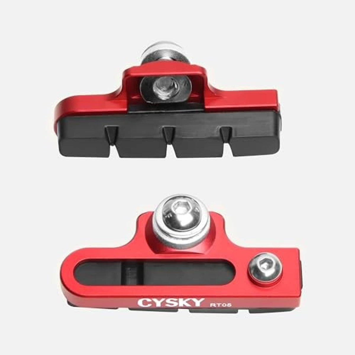 Two red C-caliper brake pad adapters with black pads and silver mounting bolts