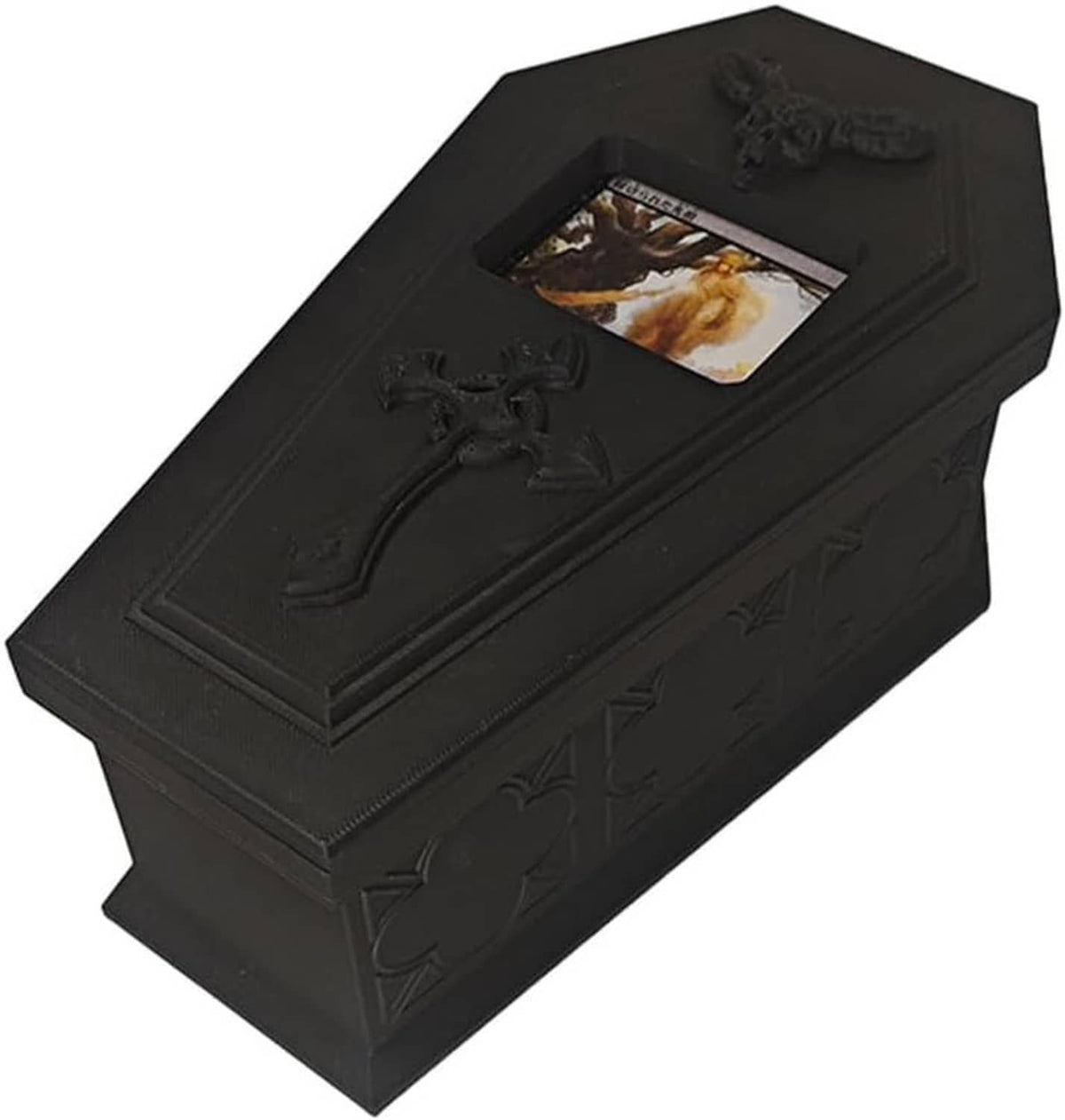 Black coffin-style deck box with embossed side scrollwork and top decorative emblem
