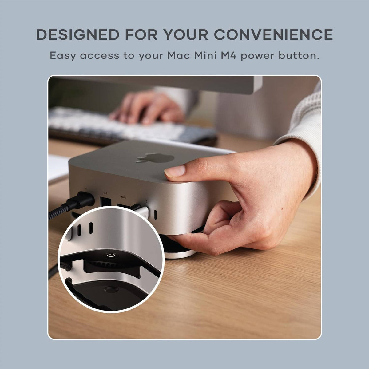 Silver docking hub stand with side access for reaching the power button