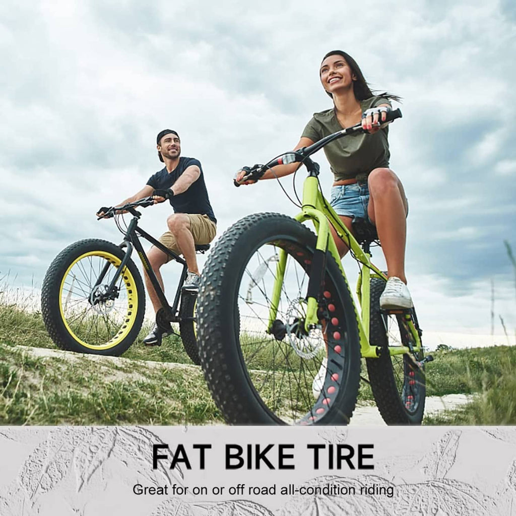 Fat bikes with front and rear black knobby tires for off-road riding