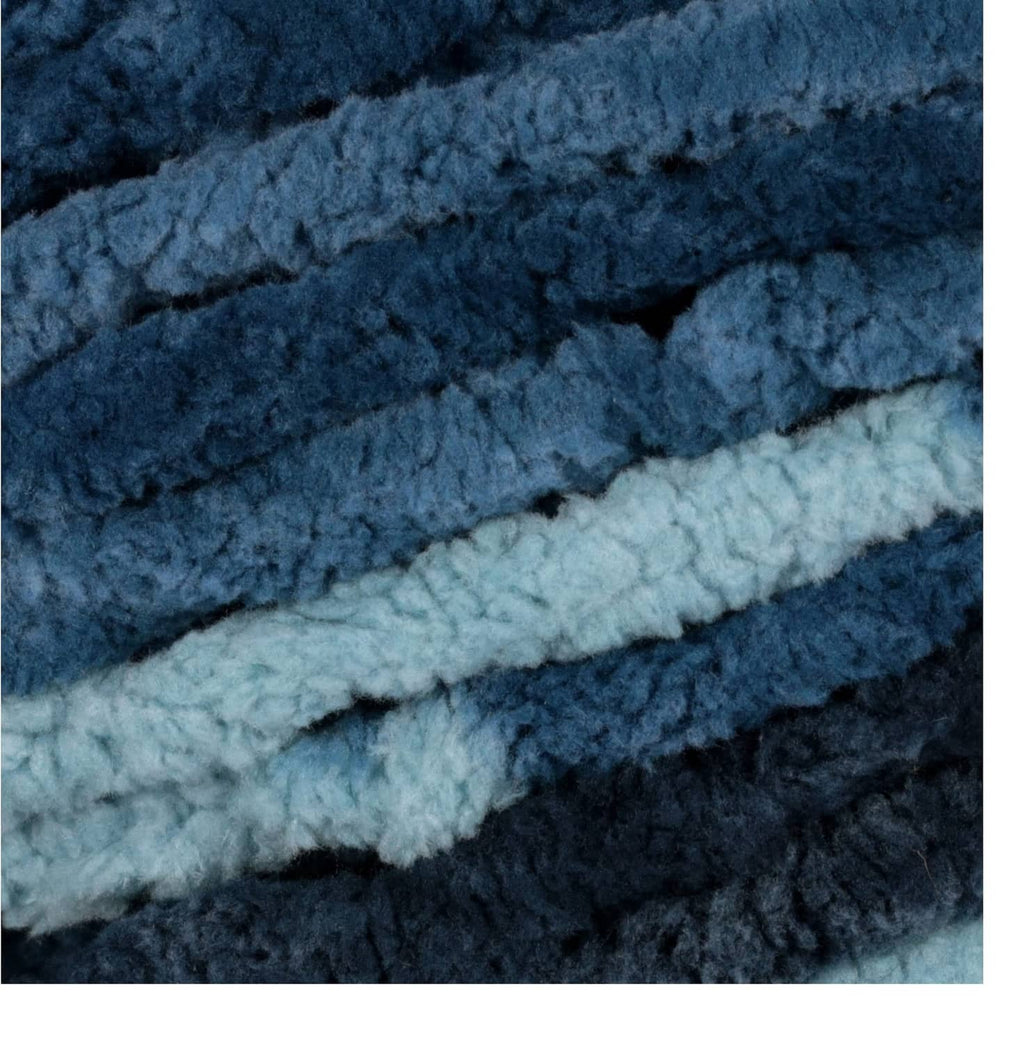 Blue-teal striped chenille yarn close-up texture for knitting and crocheting, super bulky