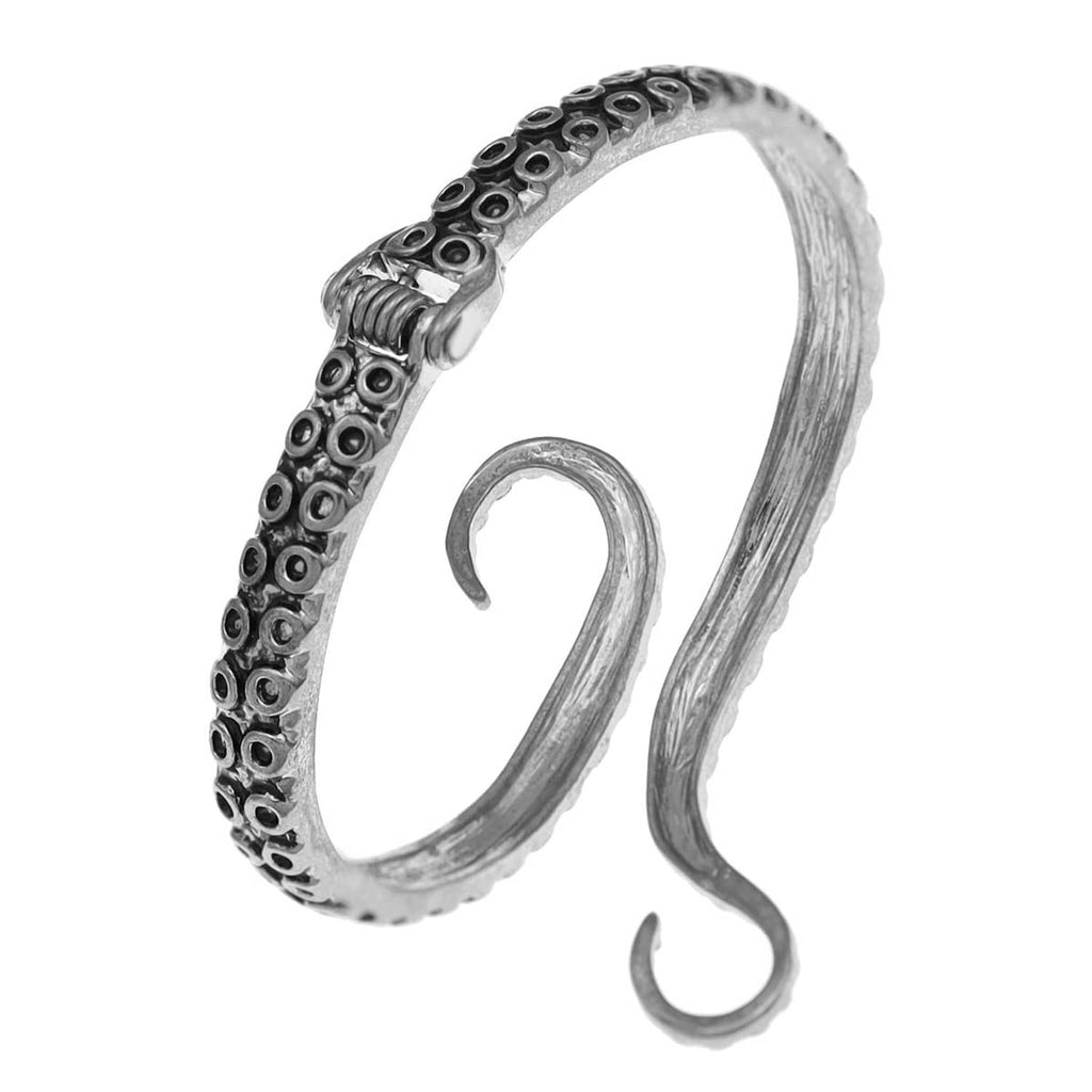 Silver-toned cuff bracelet with raised beaded pattern and open loop shape