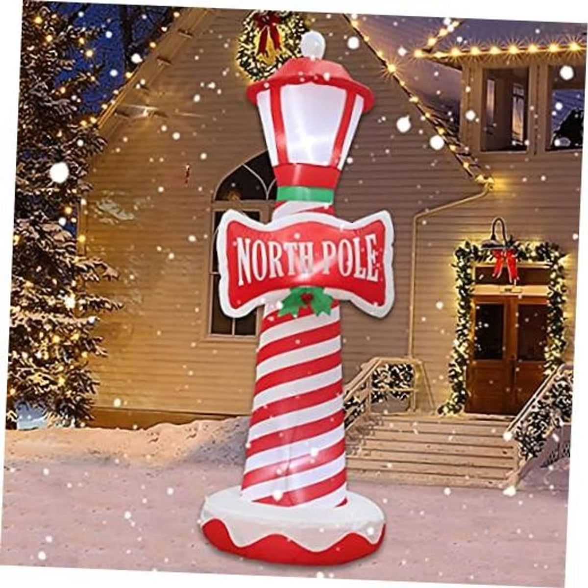 6 ft inflatable Christmas lighthouse with glowing lantern, candy-cane stripes, North Pole sign