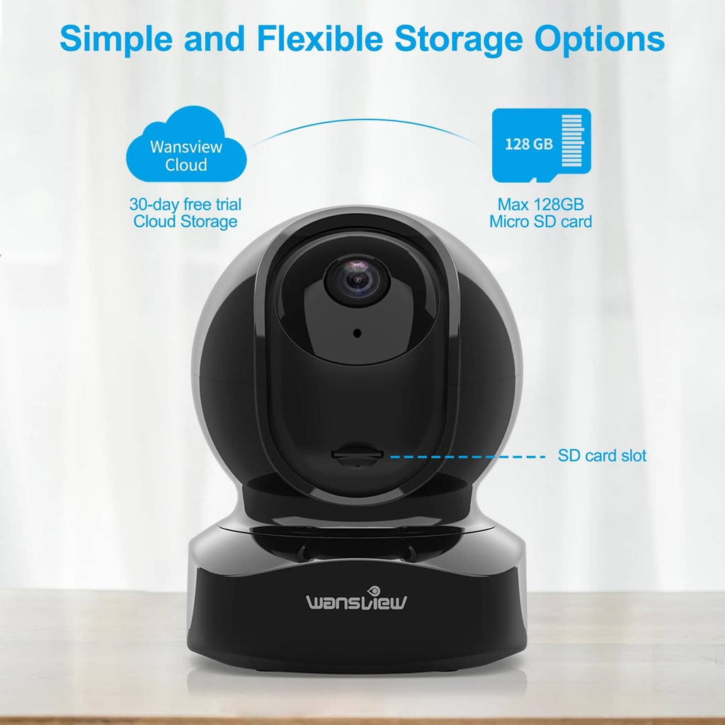 Black indoor security camera on base with visible SD card slot area