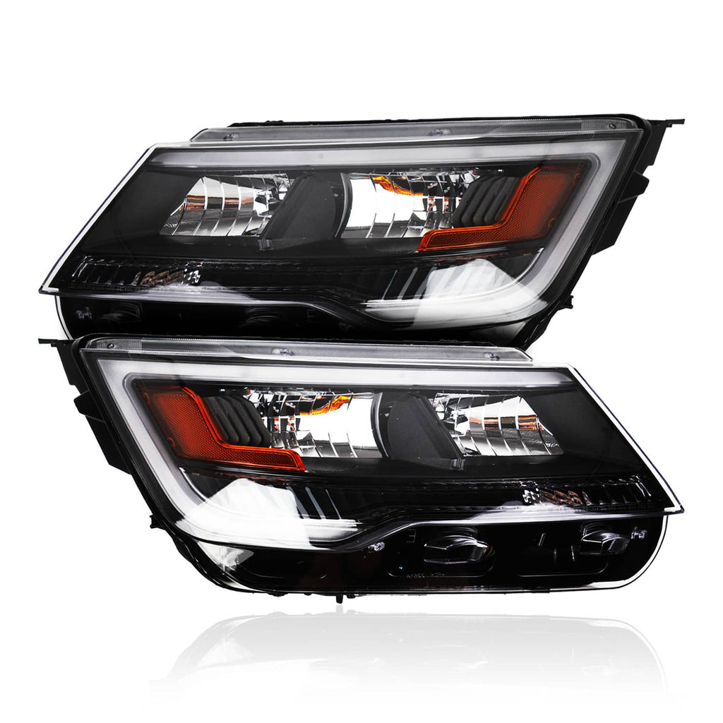 Pair of black headlight assemblies with amber side markers and clear projector lens
