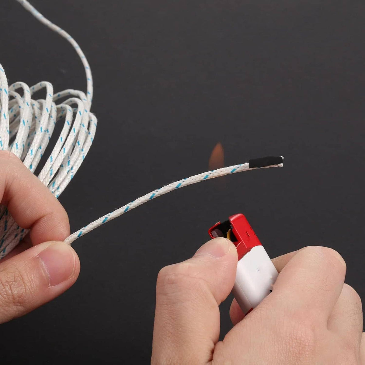 Thermocouple probe wire with blue-gray twisted cable and yellow/black sensor tip