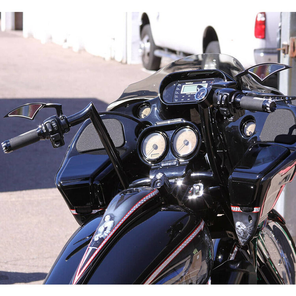 Motorcycle with black blade rear view mirrors near the instrument cluster