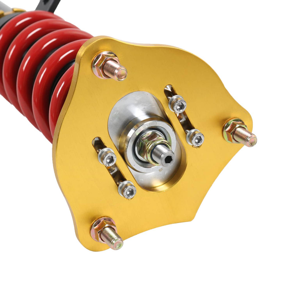 Coilover top mount with red spring and gold plate, exposed bolts and bearing hub