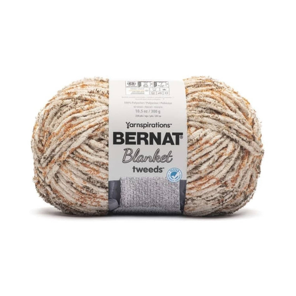 Bernat Blanket tweeds yarn skein in cream, tan, and brown flecks