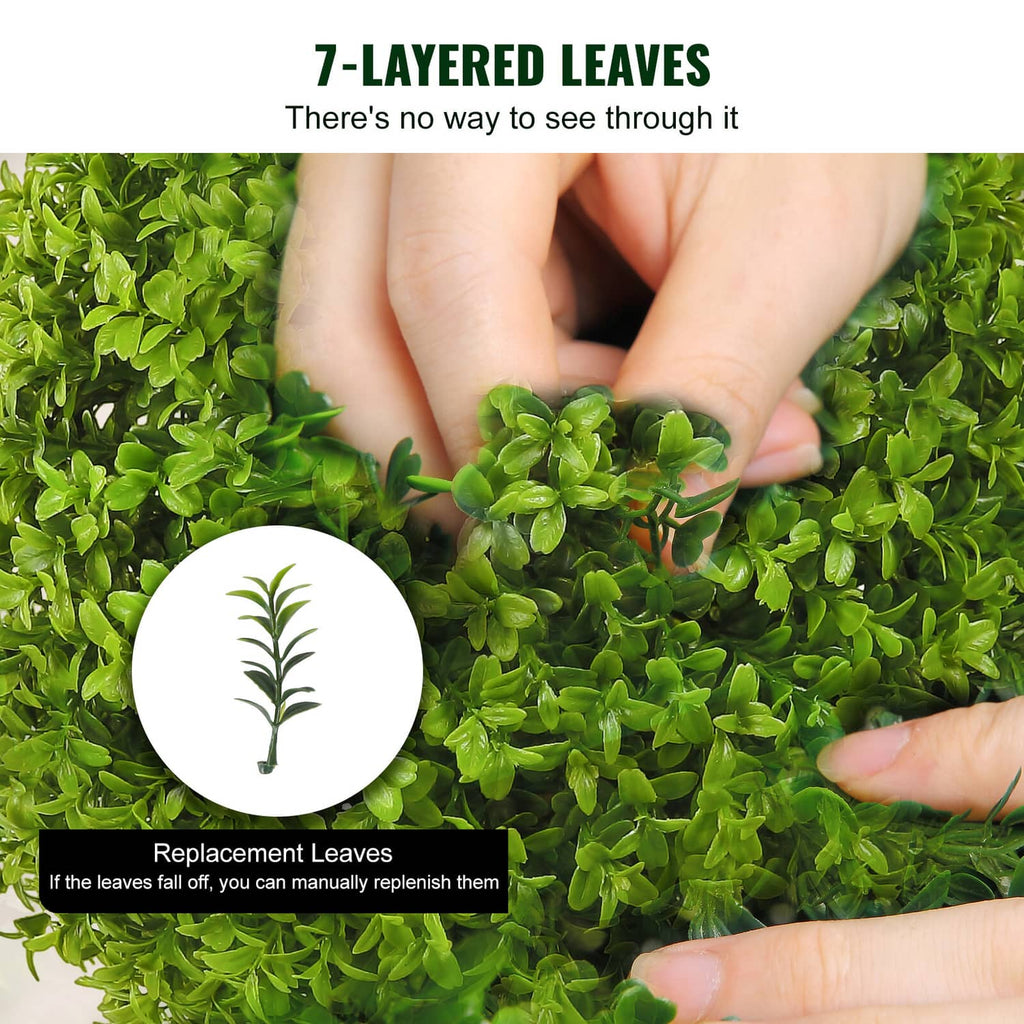 Artificial topiary leaves with replacement sprigs and visible textured foliage